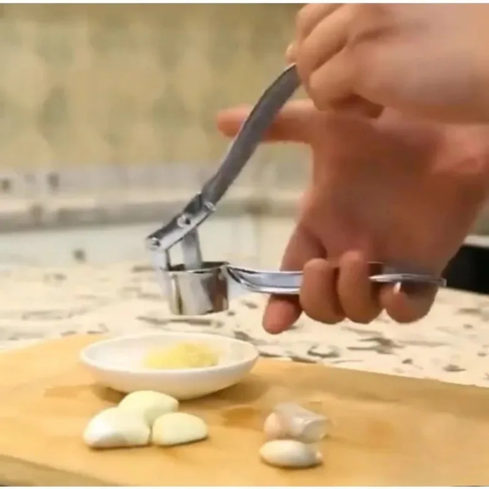 Hot Garlic Mincer Stainless St - مراجعة Manual Garlic Press وسعره