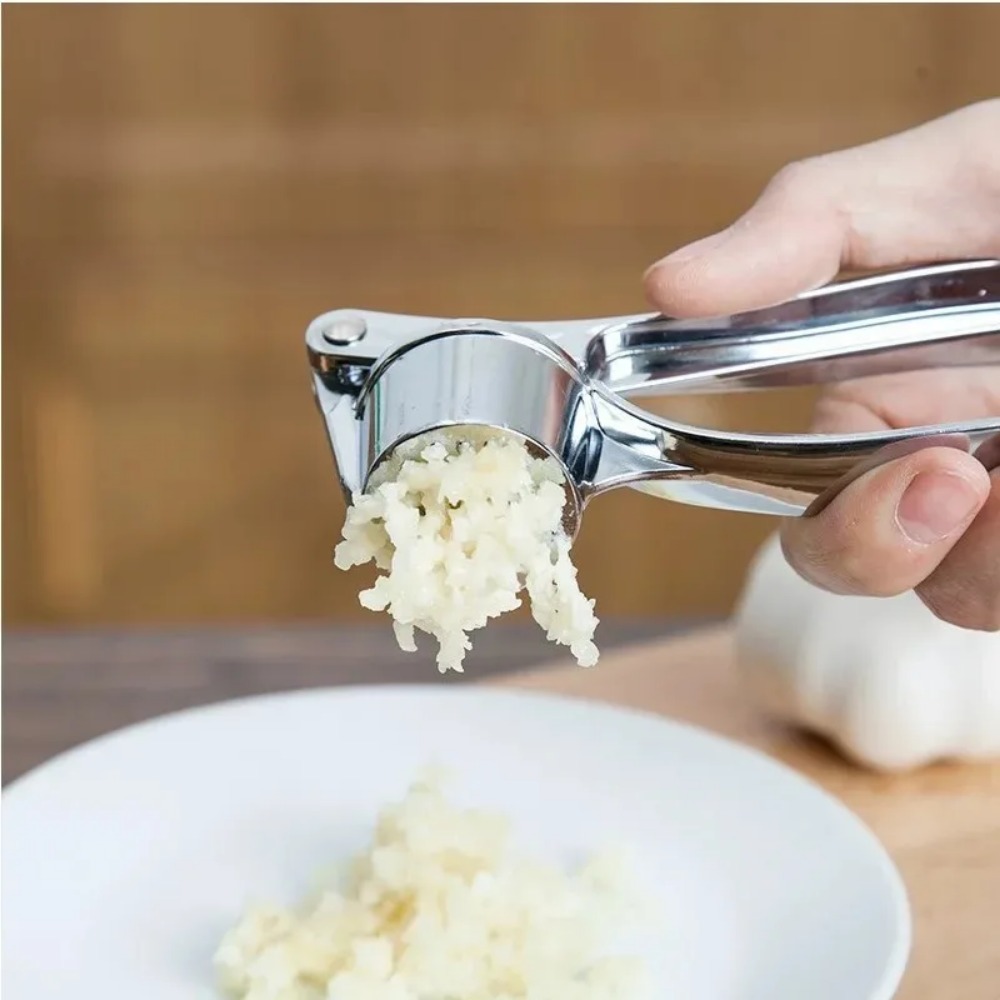 Hot Garlic Mincer Stainless St - مراجعة Manual Garlic Press وسعره