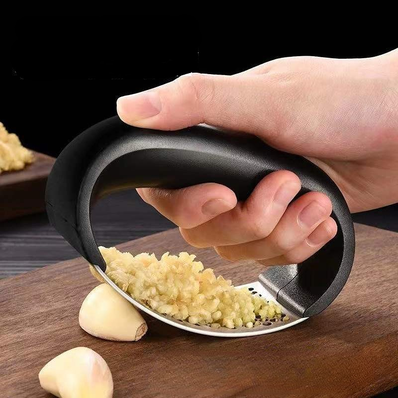 Stainless Steel Garlic Press C - مراجعة Manual Garlic Press وسعره