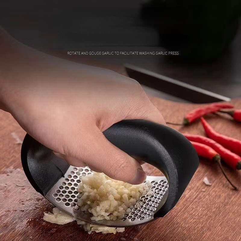 Stainless Steel Garlic Press C - مراجعة Manual Garlic Press وسعره