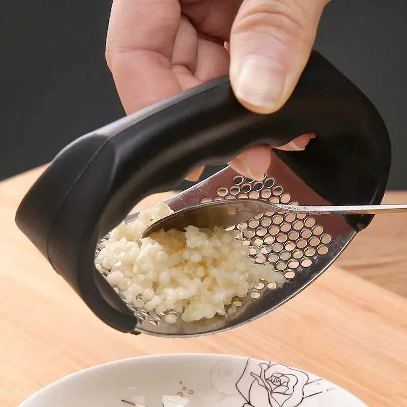 Upgraded Stainless Steel Garli - مراجعة Manual Garlic Press وسعره